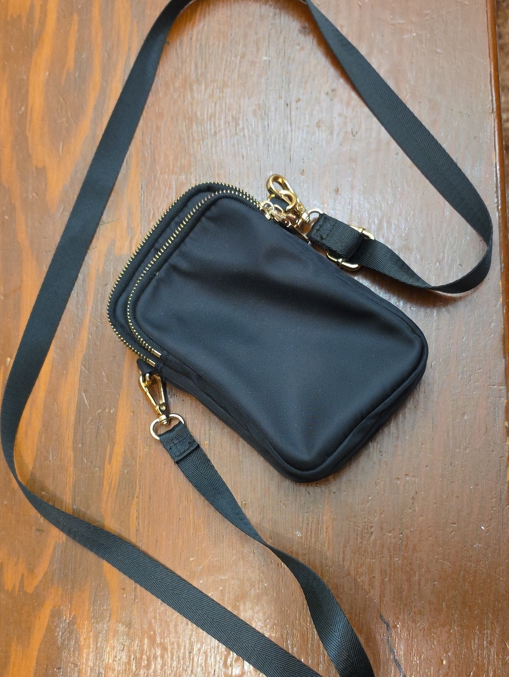 Black Crossbody Phone Pouch Bag with Gold Hardware